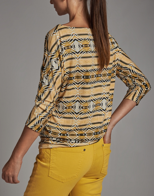 Gold print top with bat sleeves 