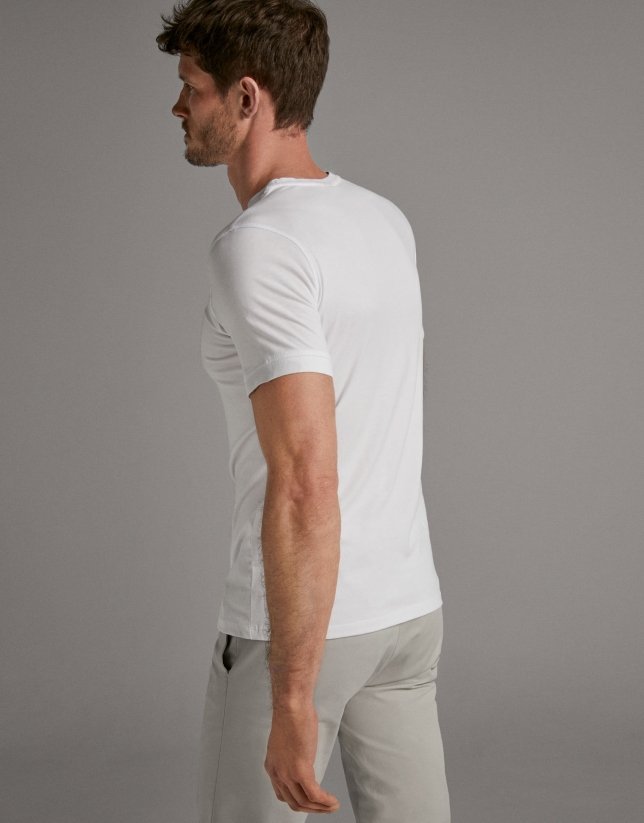 White t-shirt with gray logo
