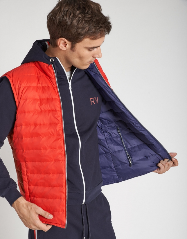 Navy blue and red reversible vest