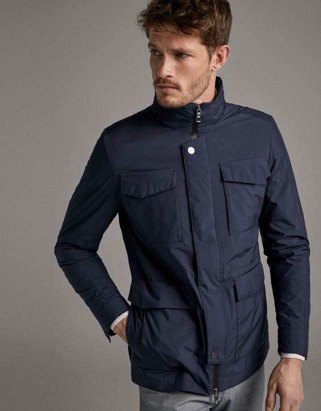 Navy blue tech fabric parka with four pockets