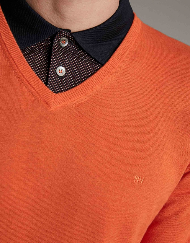 Orange turtleneck sweater