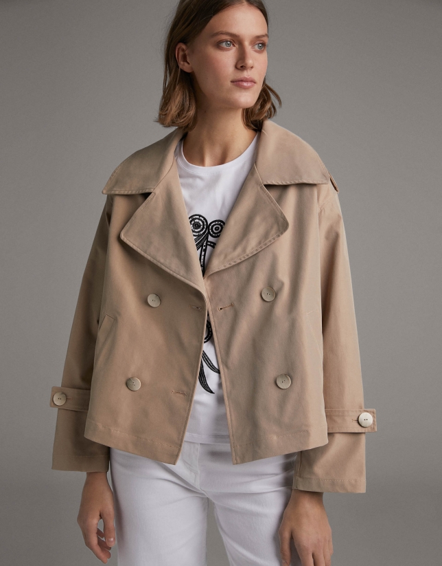 Short beige parka with double row of buttons