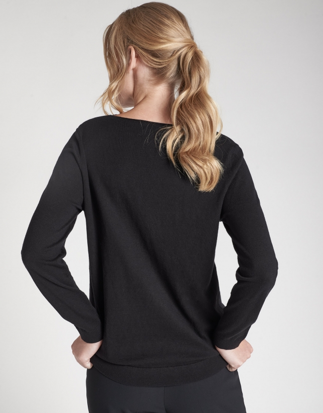 Black sweater with lace and V-neck