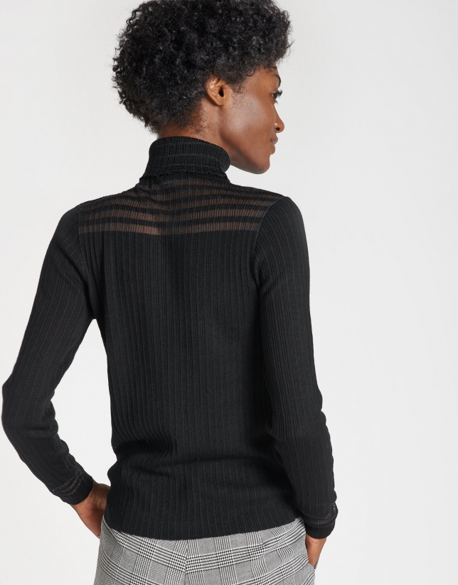 Black ribbed sweater with transparencies