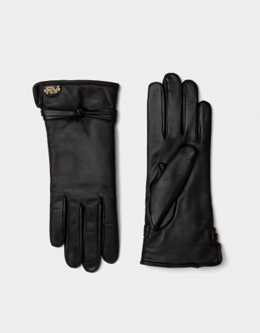
Black leather glove with decorative knot