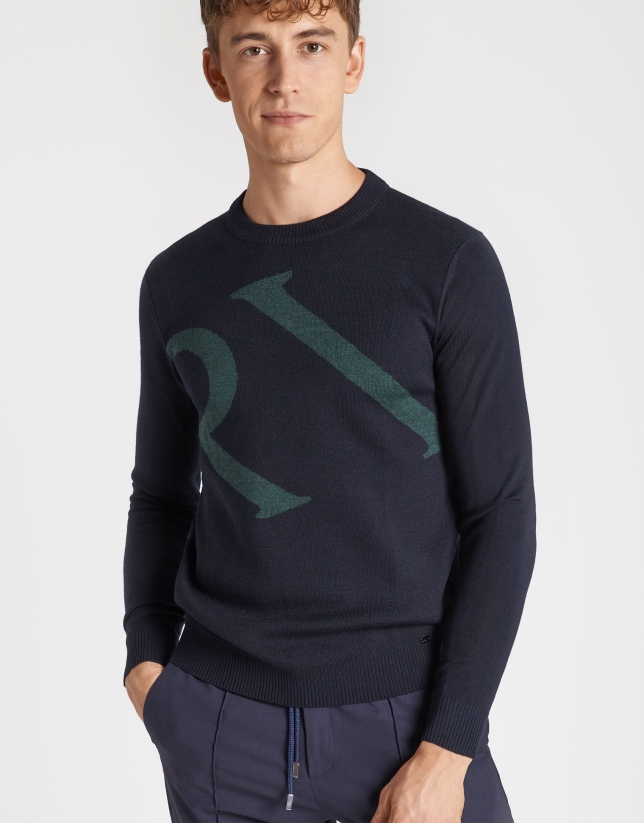 Navy blue sweater with green logo and shawl collar
