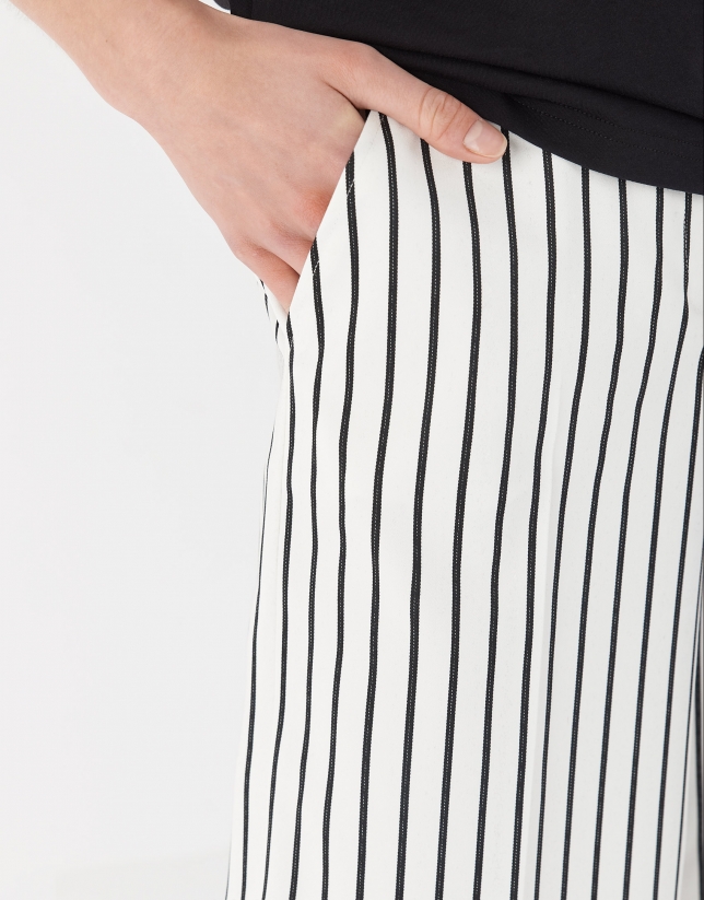 Black and white striped bermuda shorts