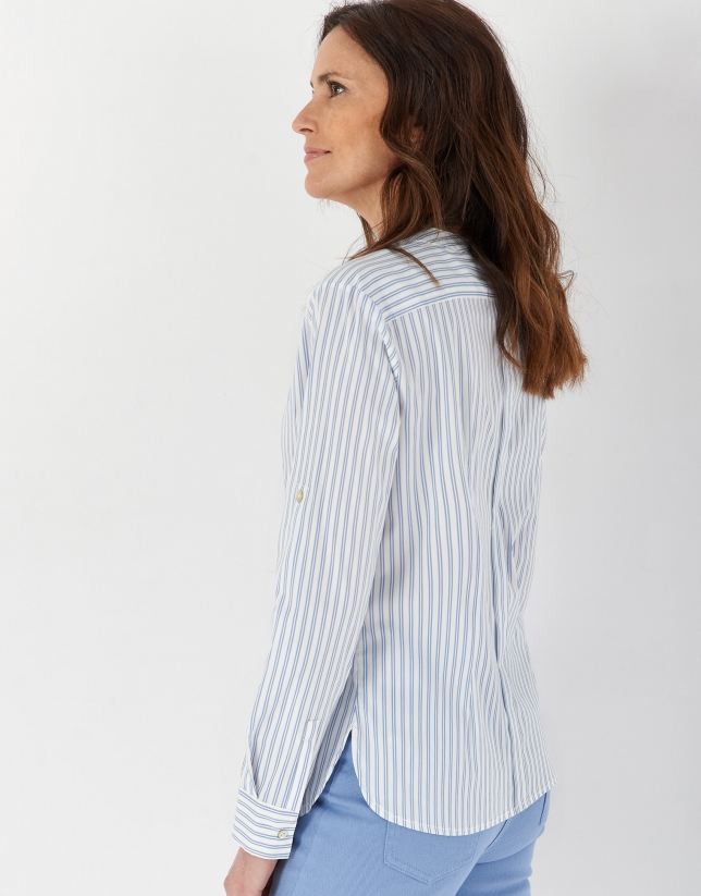 Blue and white striped shirt with belt loops on sleeves