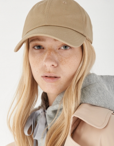 Beige baseball cap with bow in back
