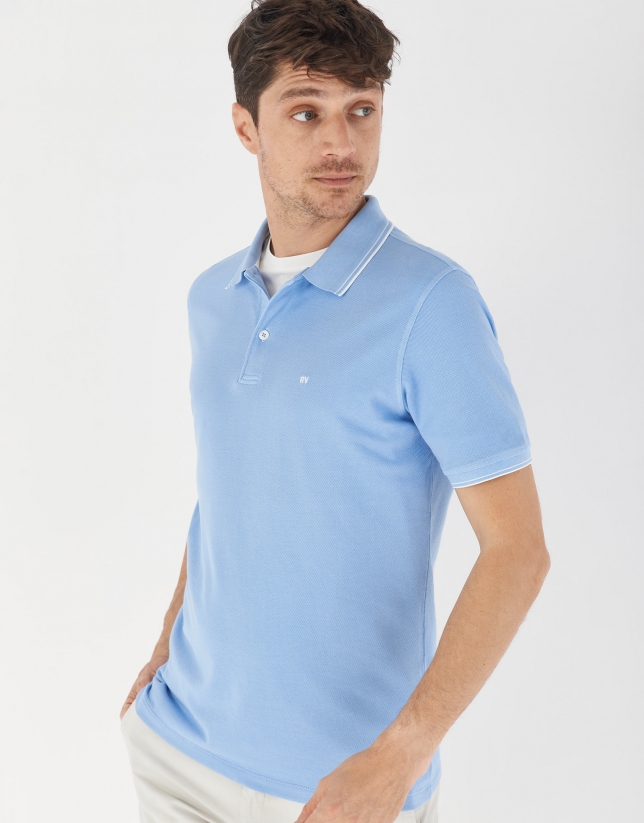 Blue pique cotton polo shirt with white outlines