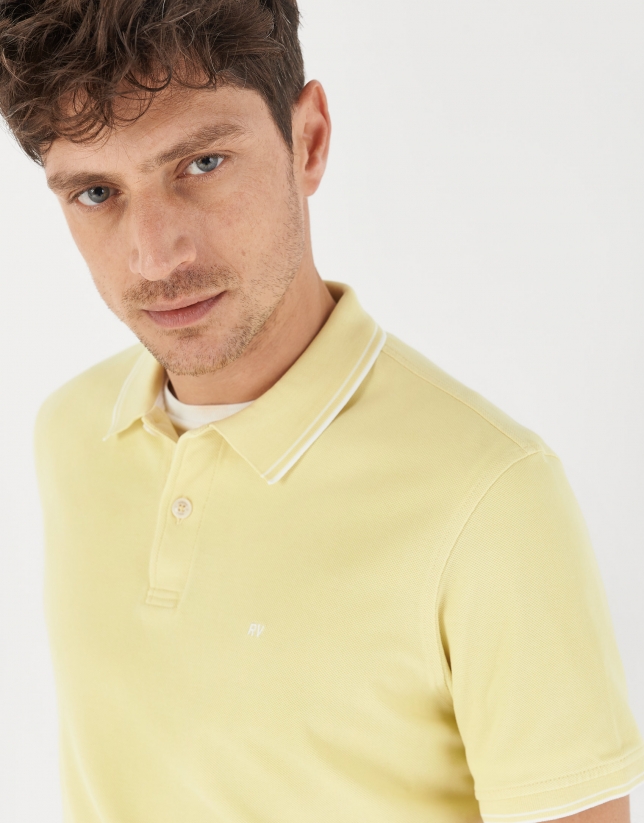 Yellow pique cotton polo shirt with white outlines