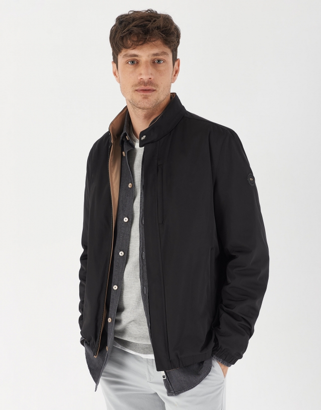 Black and brown reversible bomber jacket