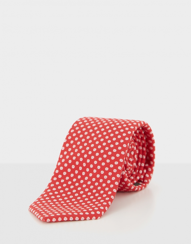Red silk tie with  off white jacquard circle design