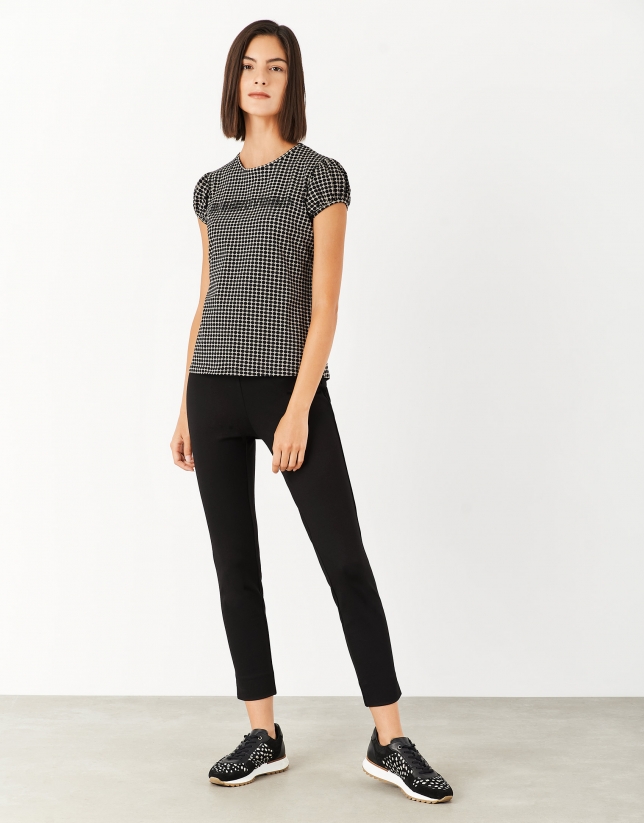 Black dotted top with strass logo