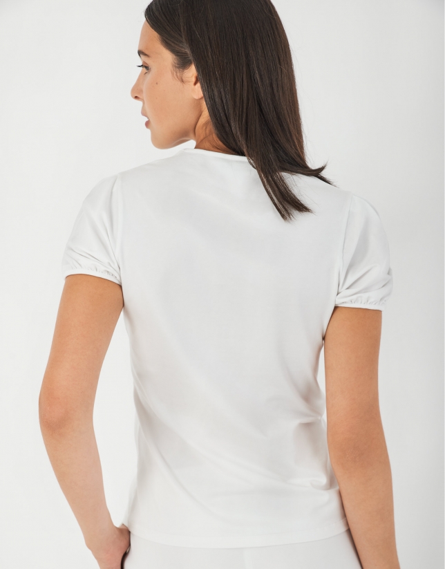 White top with short sleeves and embroidered logo