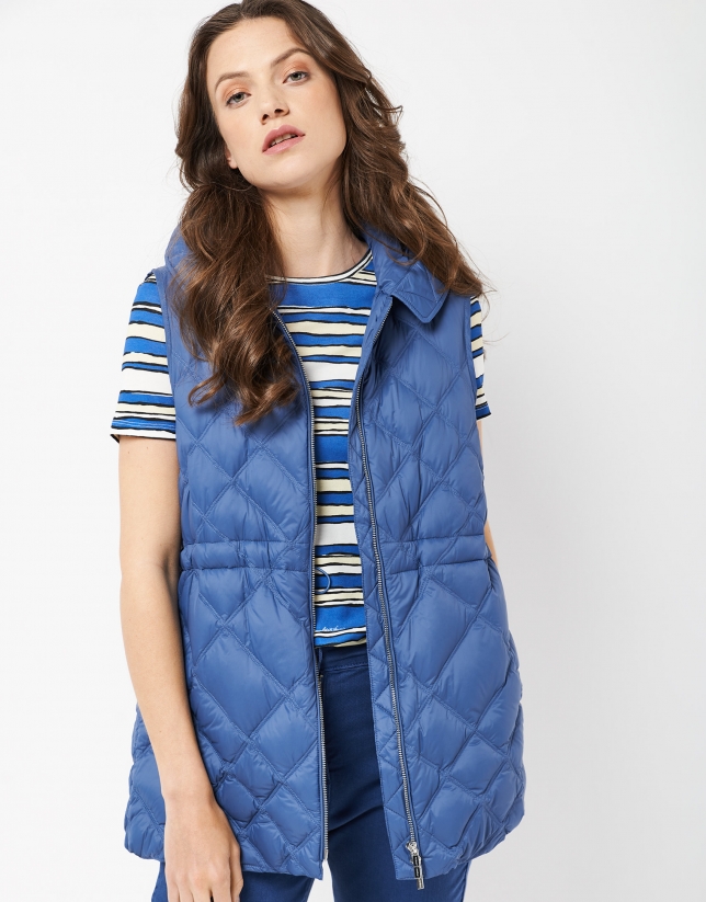 Long blue quilted vest