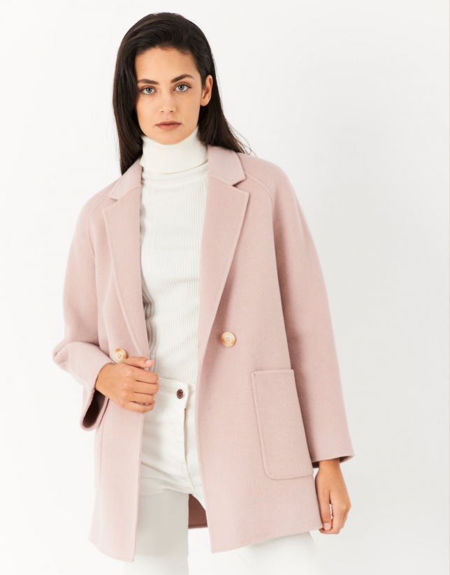 Short pink coat with double row of buttons