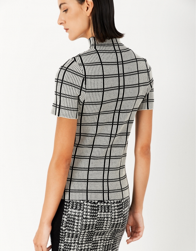 Black and white checked knit sweater with short sleeves