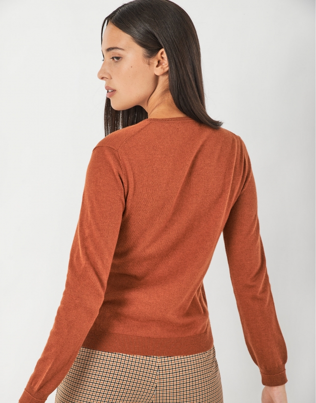 Orange assymetric sweater with fine knit