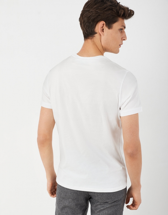 White cotton top with rounded gray logo