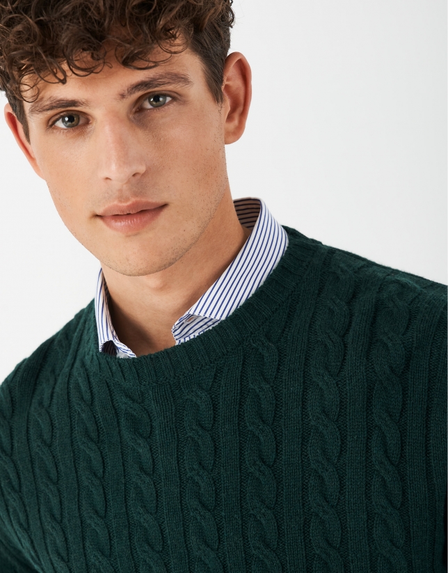 Green cable-stitched sweater