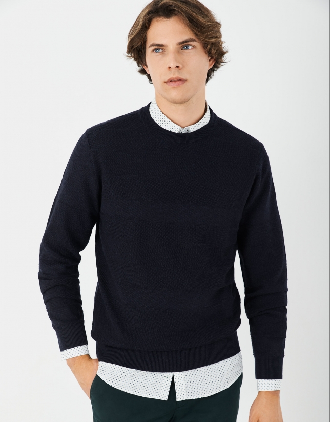 Navy blue sweater with embossed horizontal design