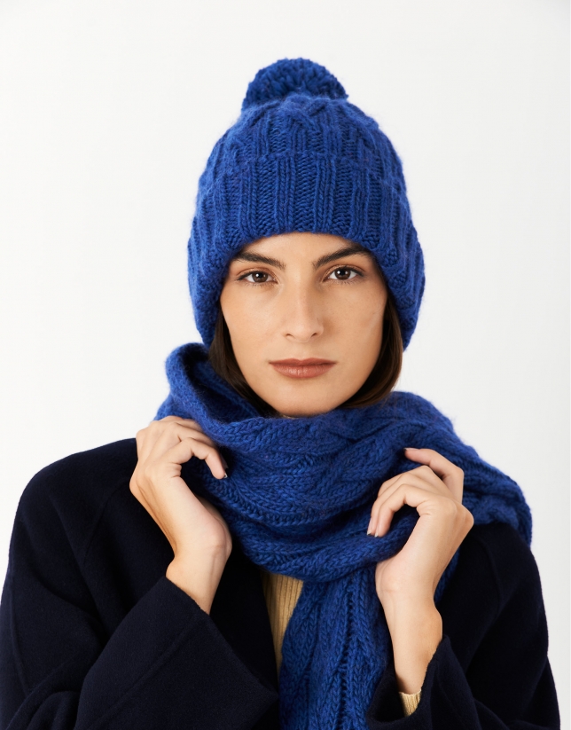 Blue wool cap with woven figure eight pattern