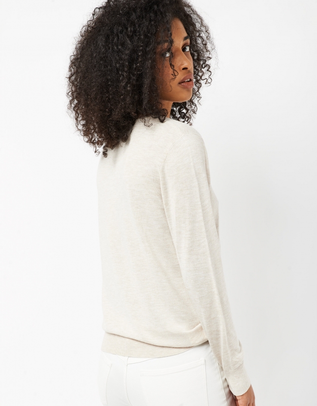 Off white, thin knit sweater with V-neck