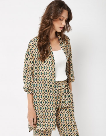 Loose asymmetric blouse with green print