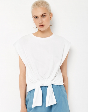 White top with puckering and knotting in the front.
