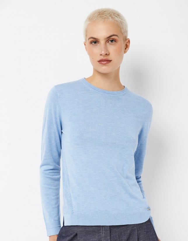 Light blue assymetric sweater with fine knit