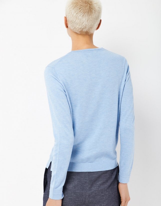 Light blue assymetric sweater with fine knit