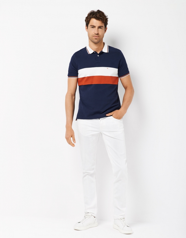 Navy blue polo shirt with orange and white stripes