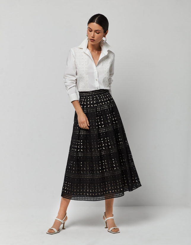 Long black skirt with openwork fabric
