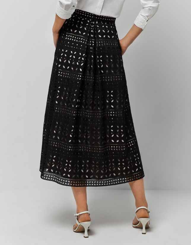 Long black skirt with openwork fabric