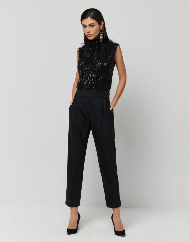 Black jumpsuit with sequins and feathers