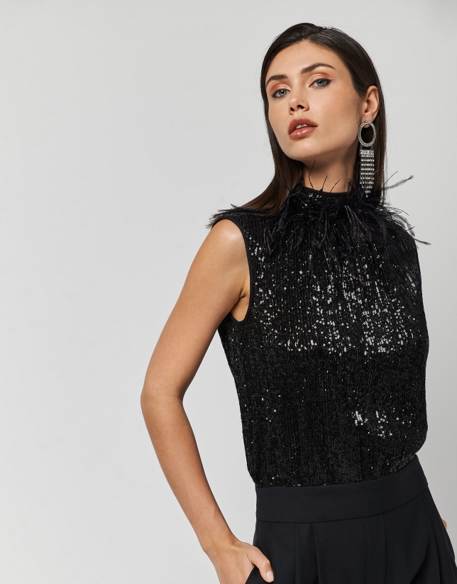 Black jumpsuit with sequins and feathers