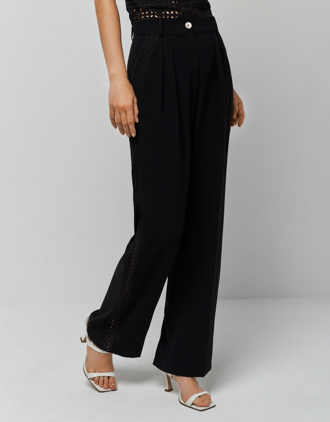 Black crepe pants with side openwork ribbon 