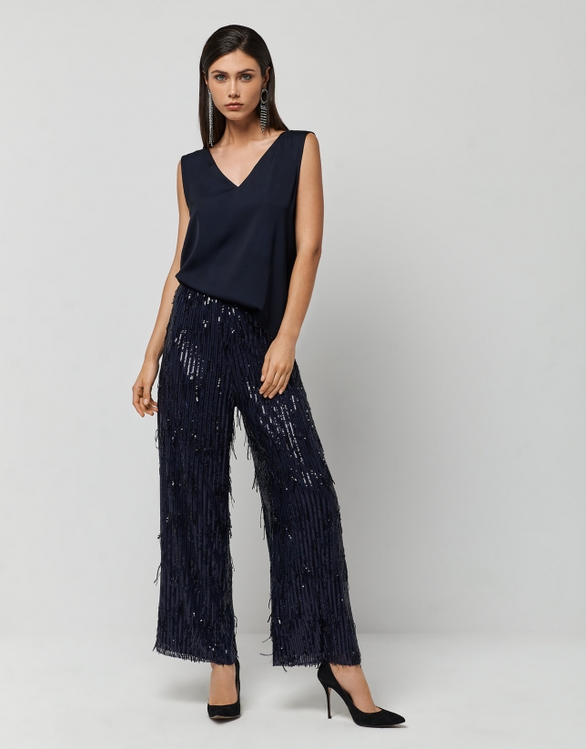 Midnight blue sequined pants with ribbons
