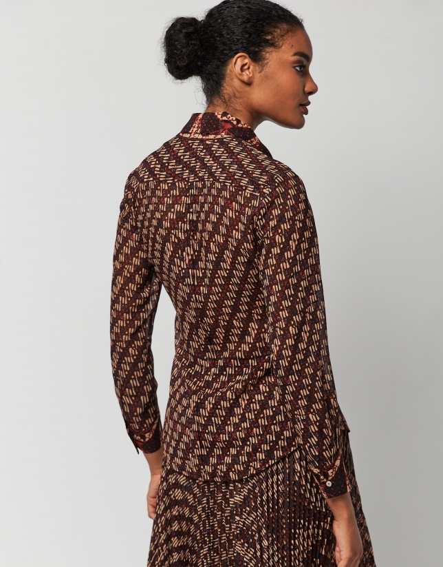 Brown, red and blue print blouse with jabot collar