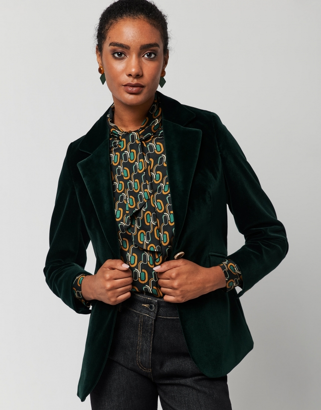 Green and mustard geometric print blouse with black jabot collar