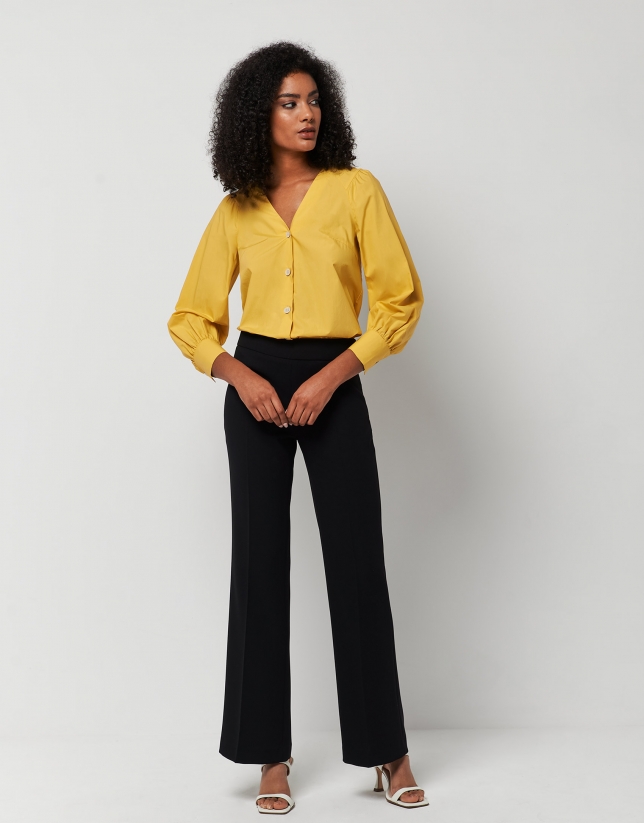 Yellow blouse with V-neck and bow