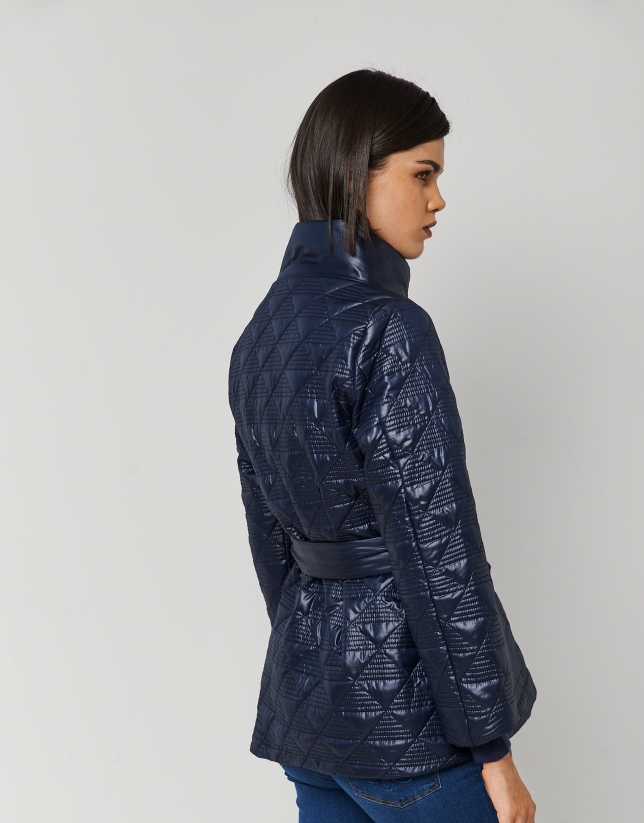 Navy blue quilted windbreaker with triangle print