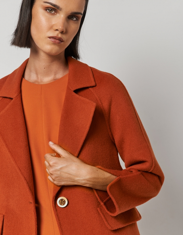 Three-quarter orange double-faced wool coat