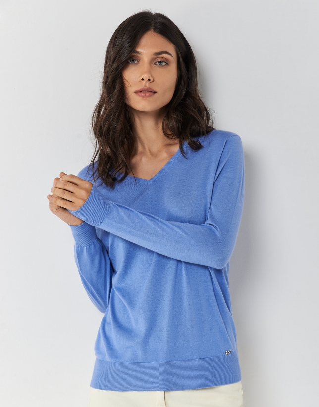 Blue fine-knit V-neck sweater
