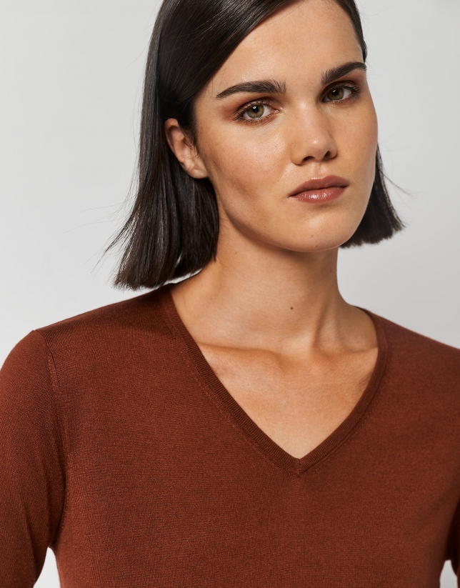 Orange fine-knit V-neck sweater