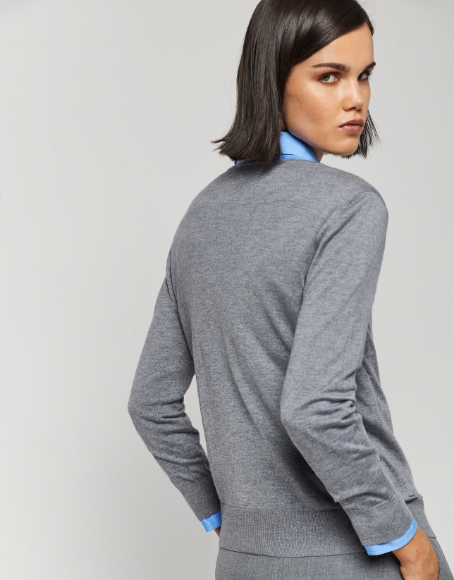Gray fine-knit V-neck sweater