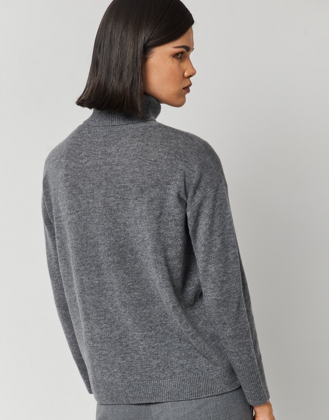 Wool and angora jacquard sweater with design of figures at the bottom