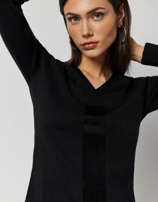 Black fine knit sweater with rhinestones in the front