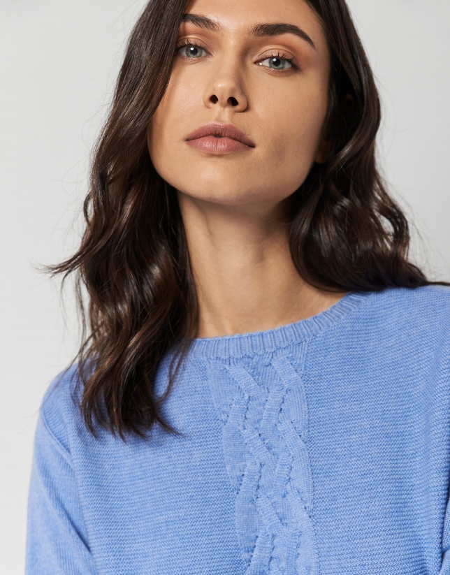 Blue wool sweater with cable-stitching in the front